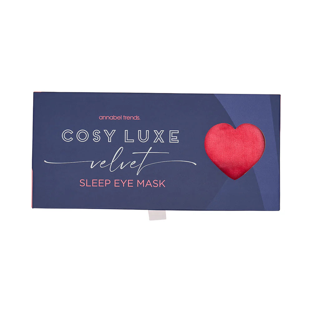 Cosy Luxe velvet sleep eye mask packaging with a red heart on a blue background