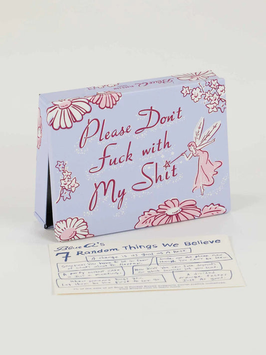 Tin pocket box with pink floral design and text on a white background