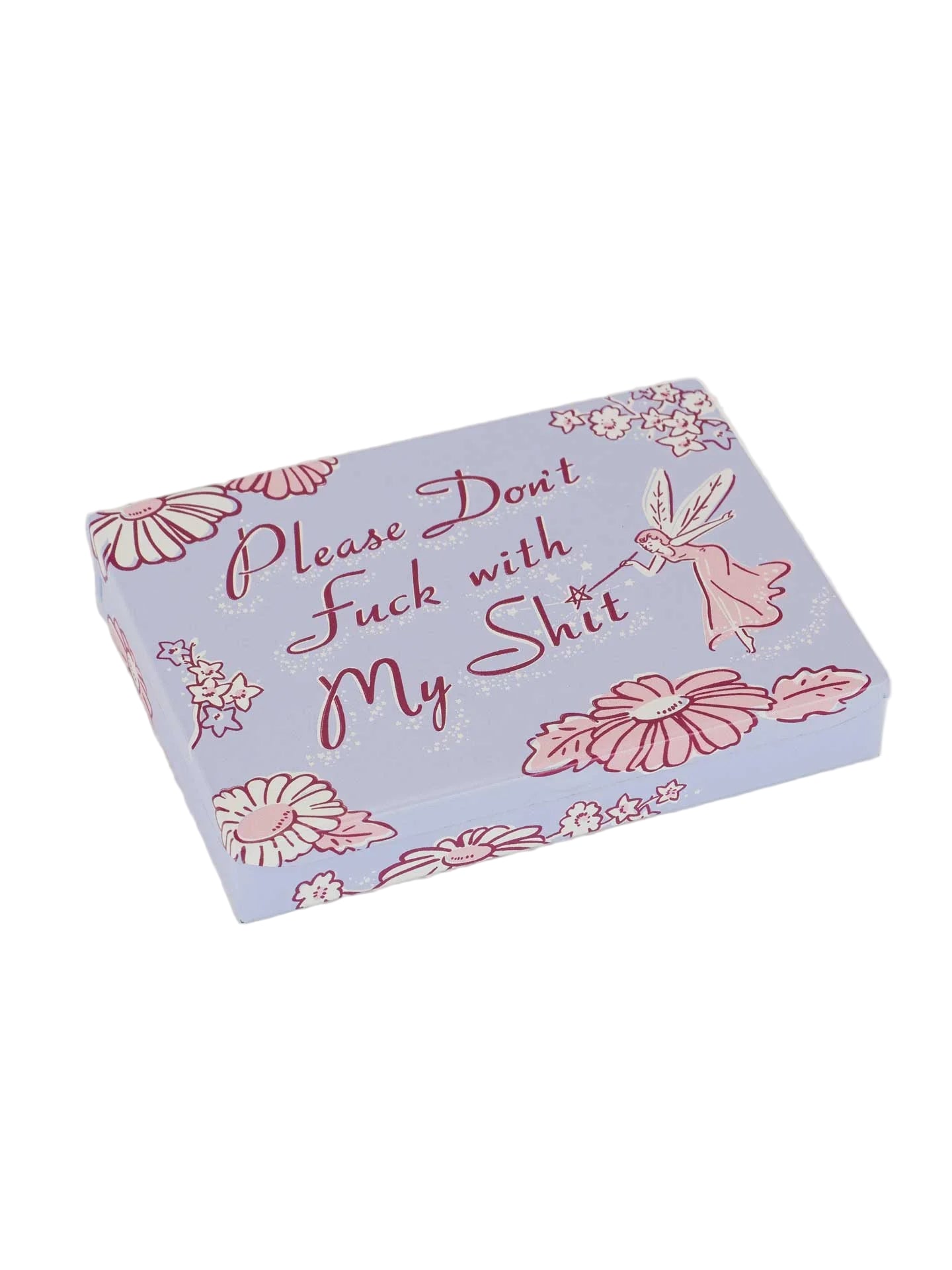 Product packaging with floral design and text on a white background