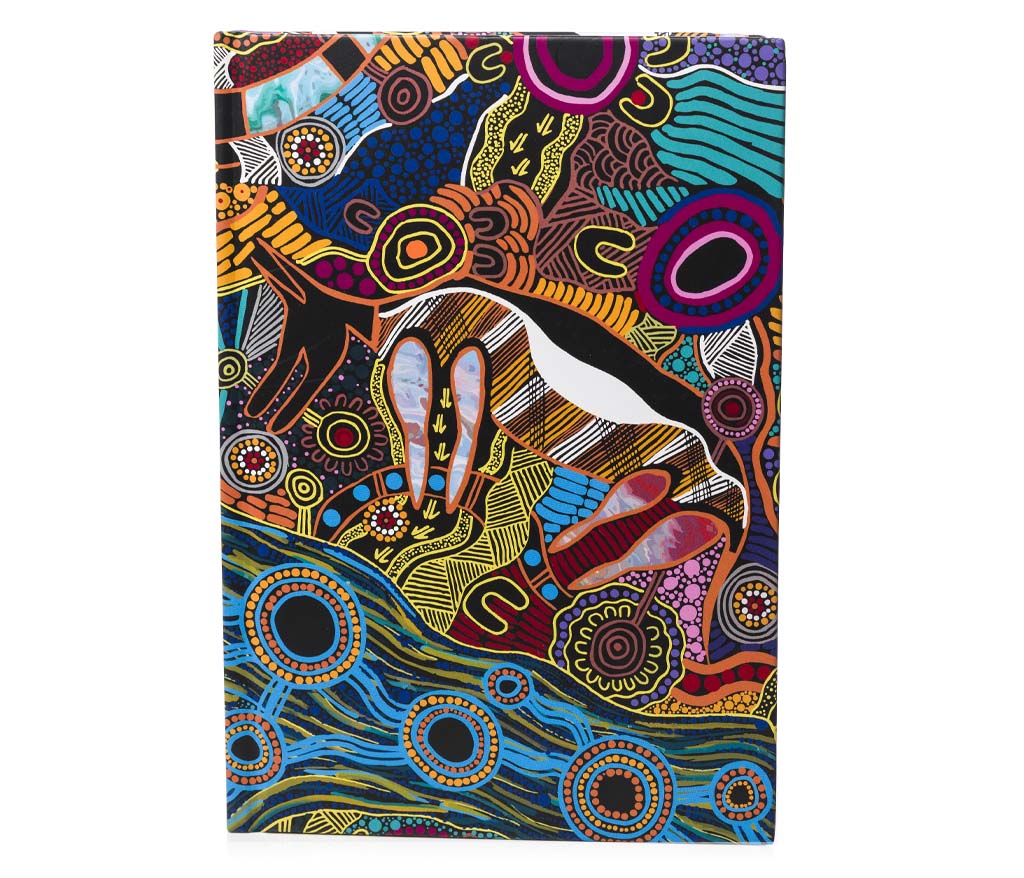 Colorful Aboriginal design notebook with artistic patterns on a white background