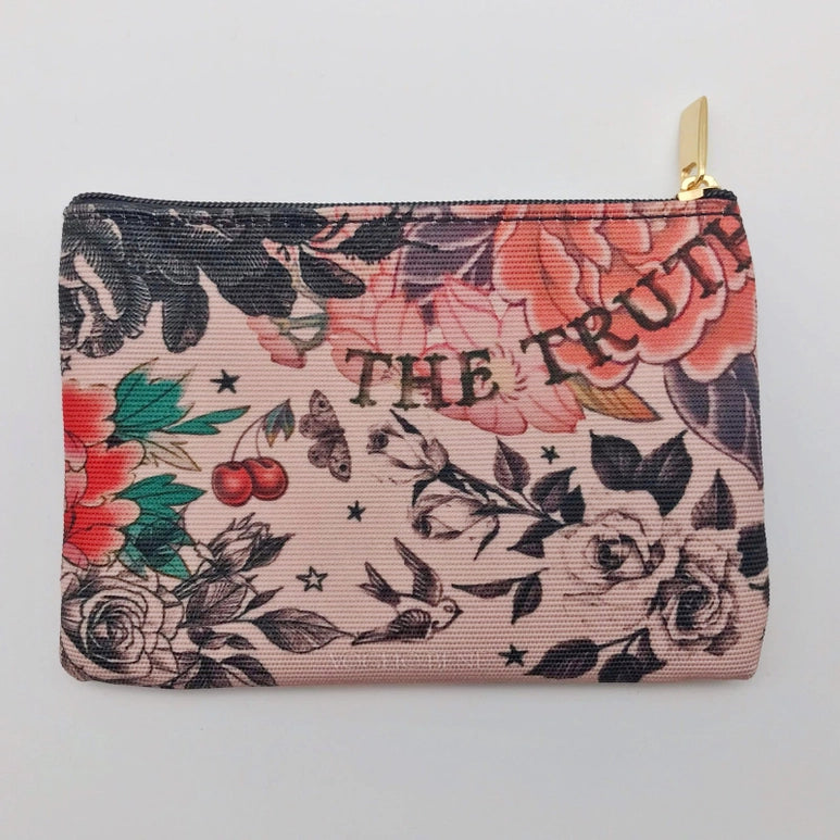 Back view of the Voglio Bene coin purse featuring a tattoo print and "The Truth" printed in the top left corner.