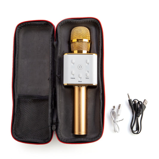 Gold wireless microphone in a black case with cables on a white background