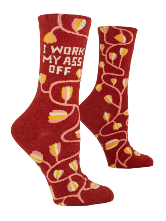 Side view of Blue Q women's crew socks featuring a brown sock and a floral arrangement. The slogan on the side reads: I work my ass off