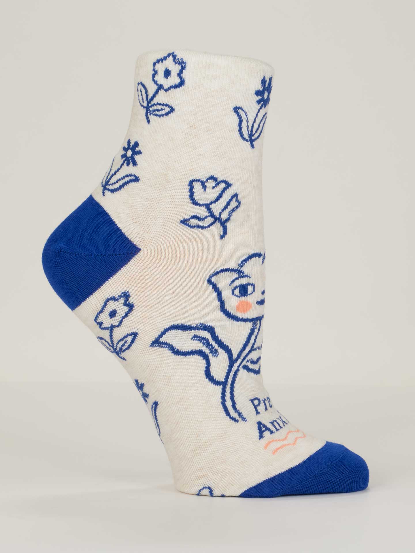 White sock with blue floral patterns on a white background