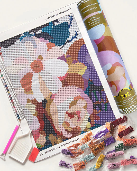 Diamond sparkle kit with a colorful design, tools, and packaging on a white background