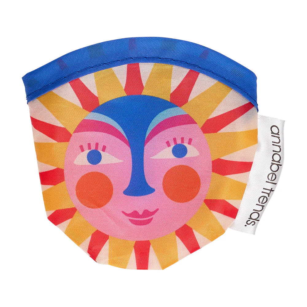 Colorful face design pouch with blue opening and 'annabel Trends' tag on a white background
