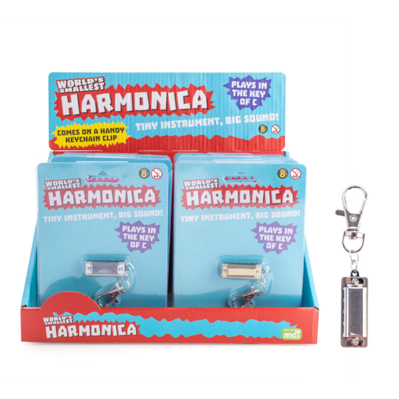 A CDU filled with World's smallest harmonica with keyring- on a white background