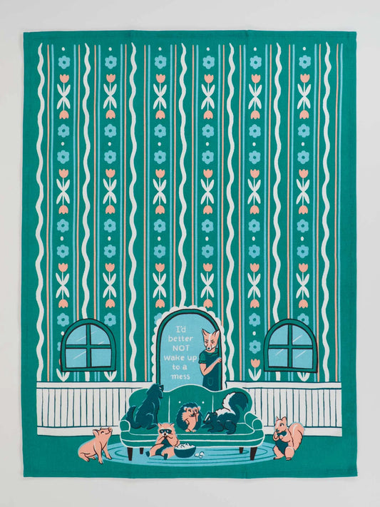 Teal fabric with a patterned design featuring a woman and children on a couch.
