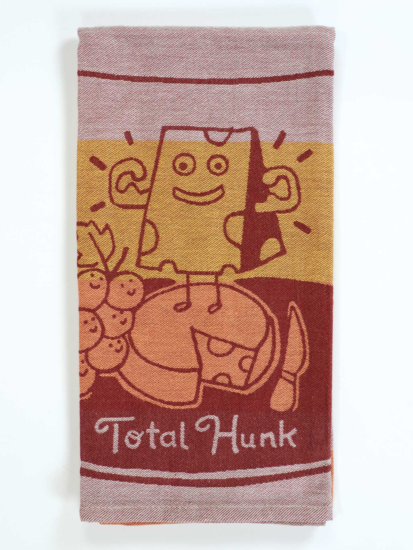 Towel with cartoon design of a box character on a horse, labeled 'Total Hunk', on a white background.