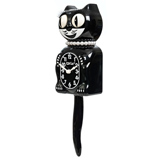 Black cat-shaped clock with white face on a white background