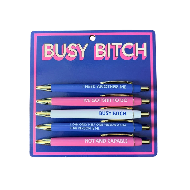 Set of pens with humorous text on a blue card labeled 'BUSY BITCH'.