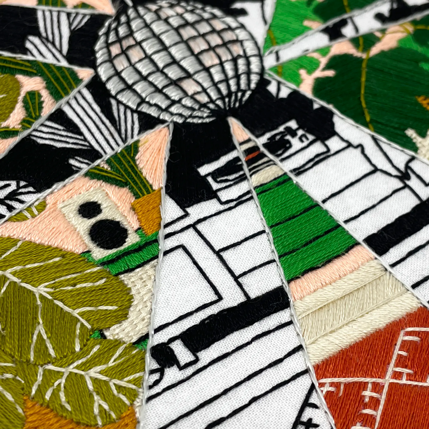 Close up vision of embroidery design and stitches for disco plants
