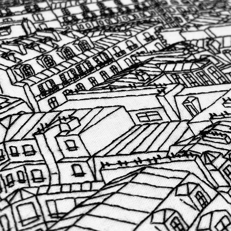 Close up of needlecraft stitches for:Embroidery DIY Craft kit- Rooftops of Paris