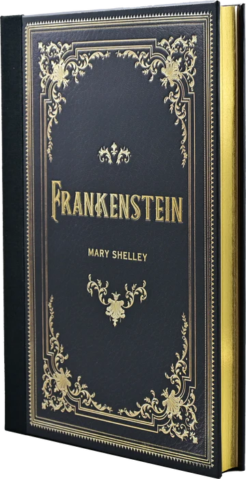 Decorative hardcover of 'Frankenstein' by Mary Shelley with ornate gold design on a black background