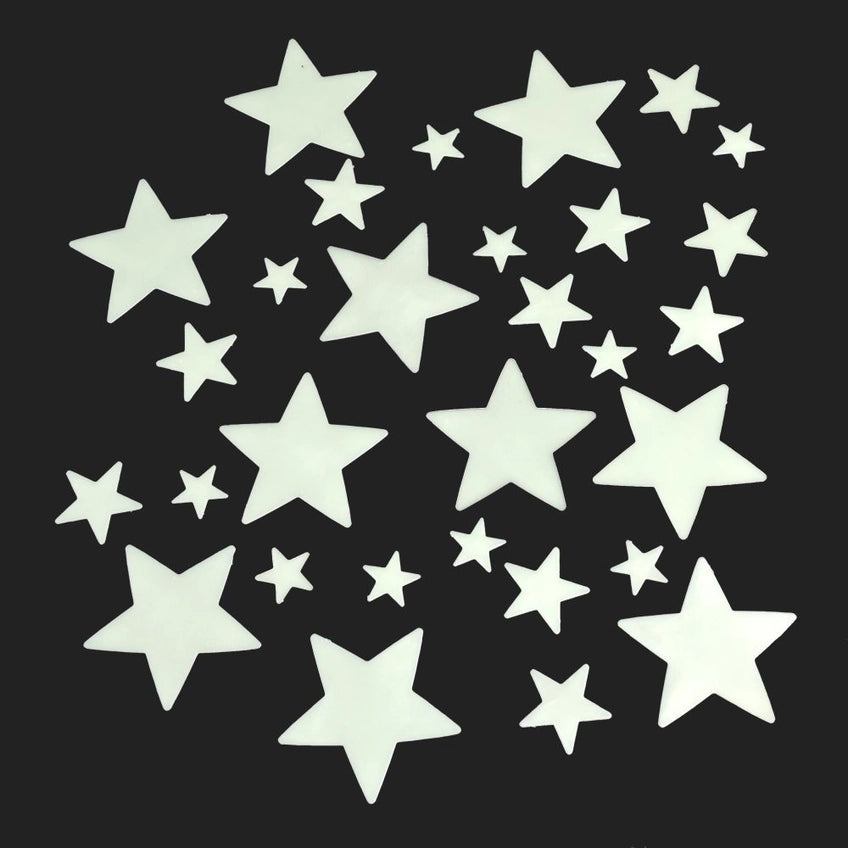 White star-shaped stickers on a black background