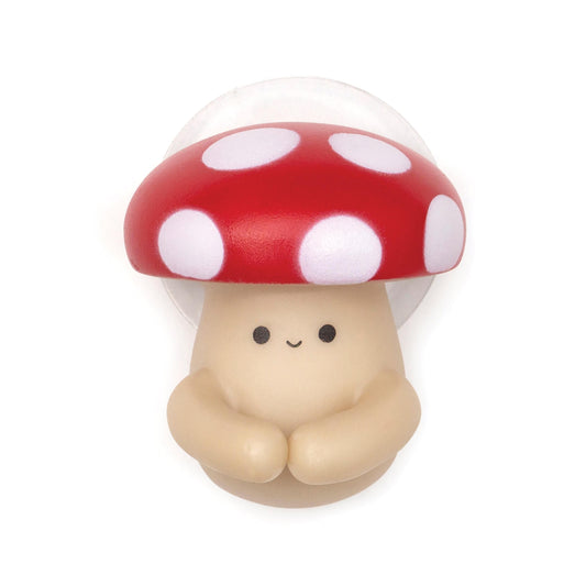 A smiling cartoonish Mushroom toothbrush holder on a white background.