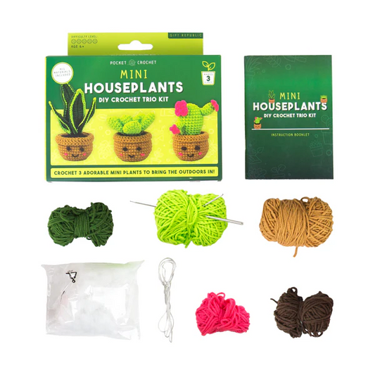 Mini houseplants crochet kit with yarn balls and packaging on a white background