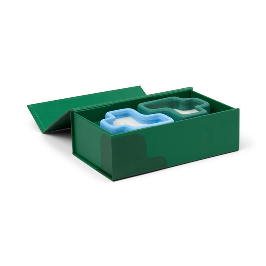 Green packaging box with a blue and green product inside on a white background