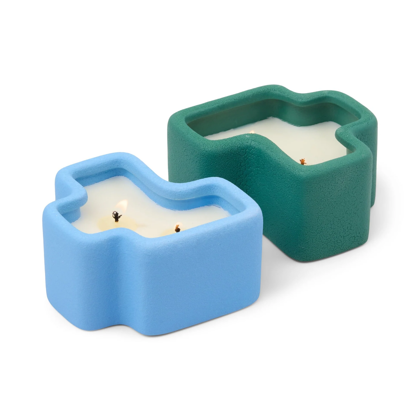 Two unique candle holders, one blue and one green, on a white background.