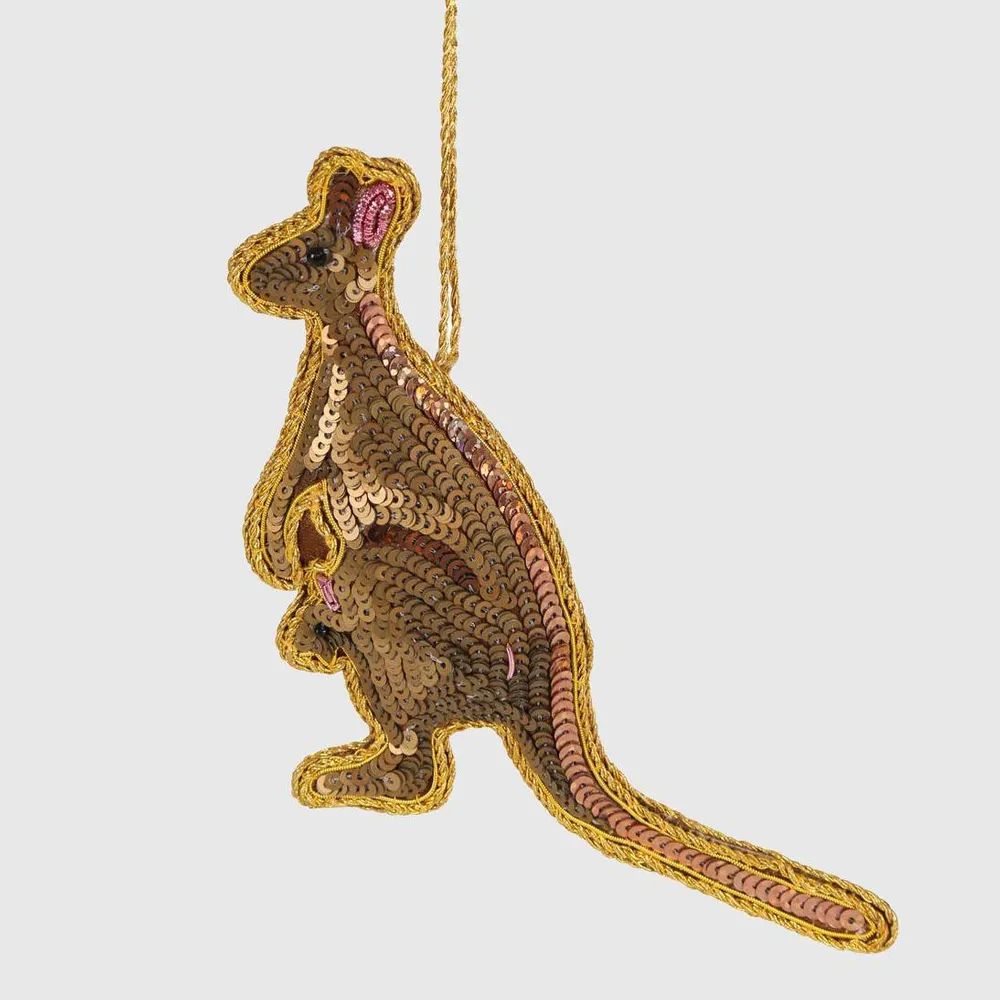 Decorative sequins kangaroo ornament with a gold outline on a light gray background