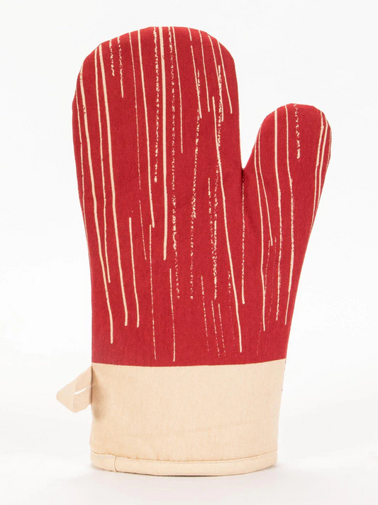 Red oven mitt with white stripes on a beige background
