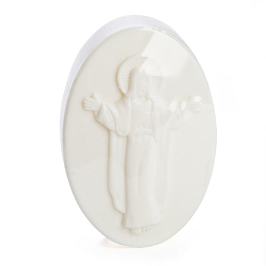 A white oval Jesus soap on a white background.