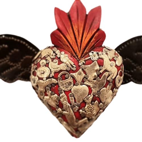 Mexican Handcrafts,wall decor handmade with traditional and cultural references. Representing Milagros(Small miracles) charms decorate crosses,hamsa,hearts. The sacred Heart is another feature , placed centrally in many wall pieces.