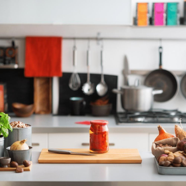 Kitchen Gizmos utensils and food prep on a cutting boards - Gizmo Gifts