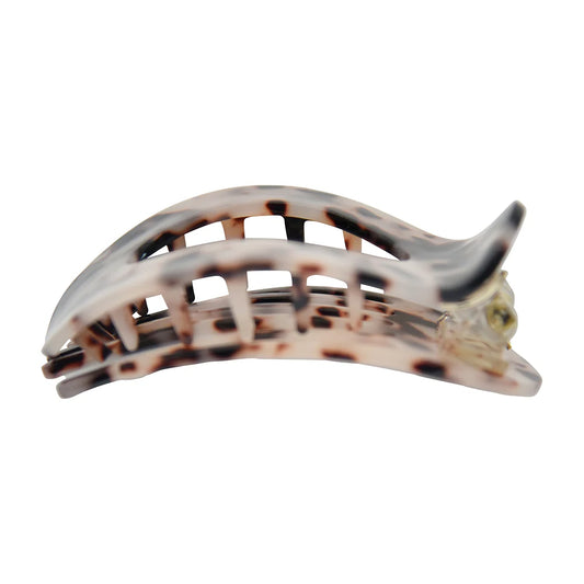 Shell-patterned hair clip on a white background