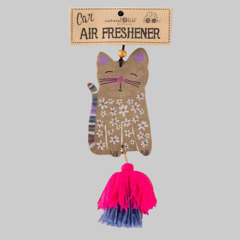 Car air freshener with cat shaped paper tag and pink tassle on a grey background