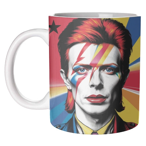 A ceramic mug featuring an image of David Bowie in a pop art style within a white background
