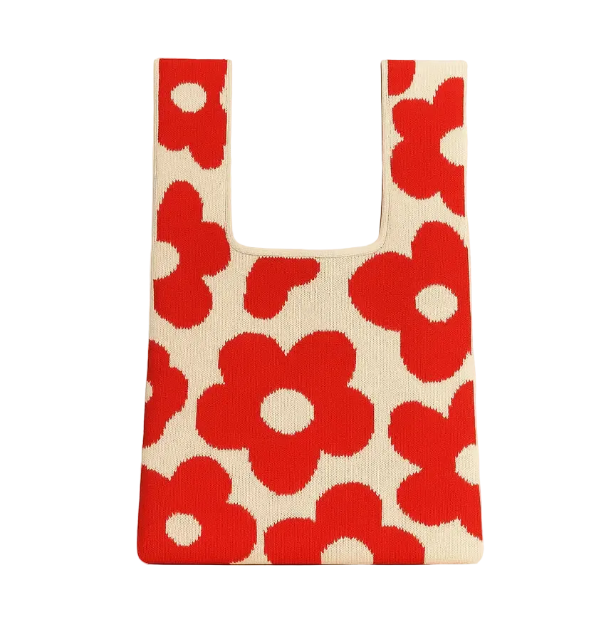 Reusable shopping bag with red floral pattern on a white
background
