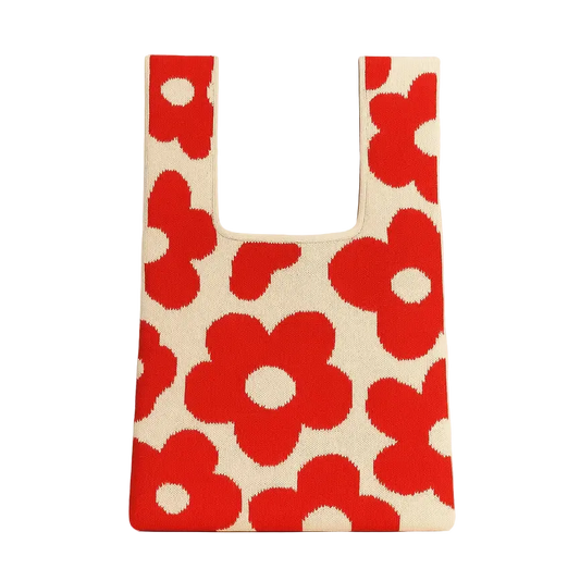 Reusable shopping bag with red floral pattern on a white
background