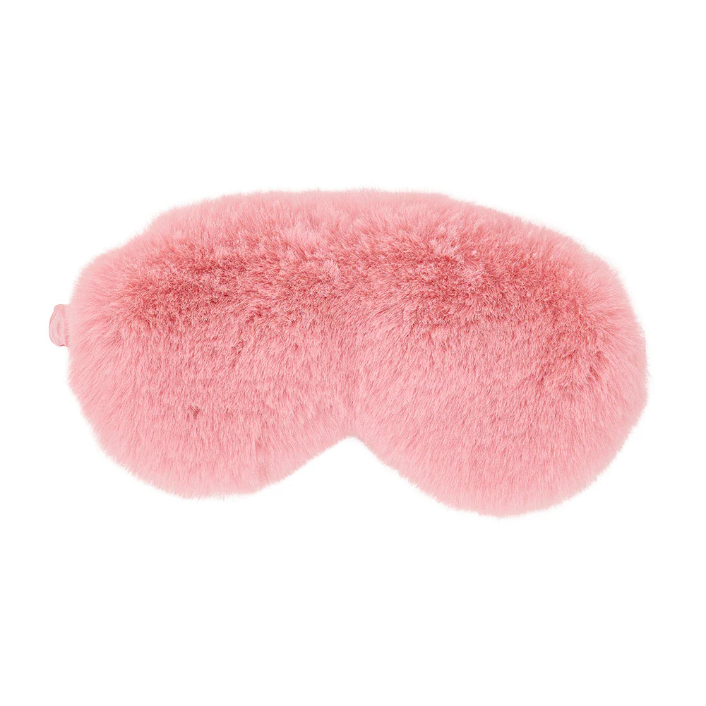 Pink fluffy eye mask on a white background