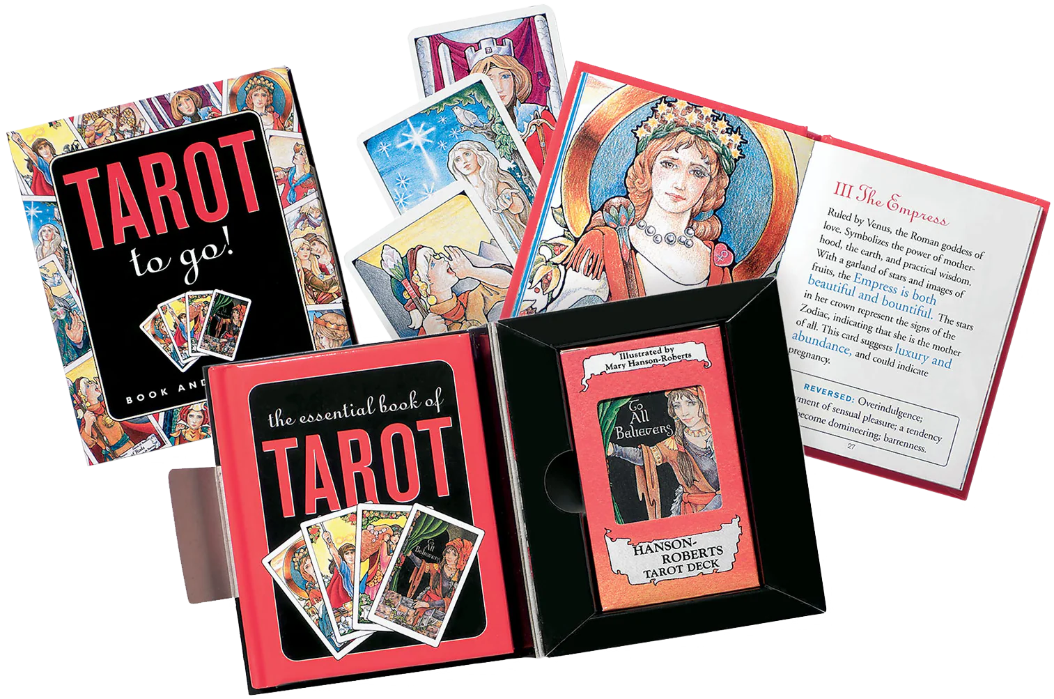 Collection of tarot cards and books on a white background