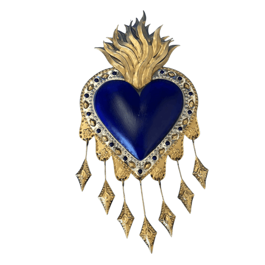 Decorative heart-shaped object with gold accents and blue heart center on a transparent background