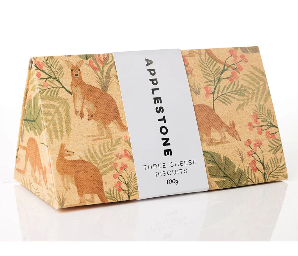 A triangular box with kangaroo images and text that reads: Applestone Three Cheese Biscuits on a white backgrund.