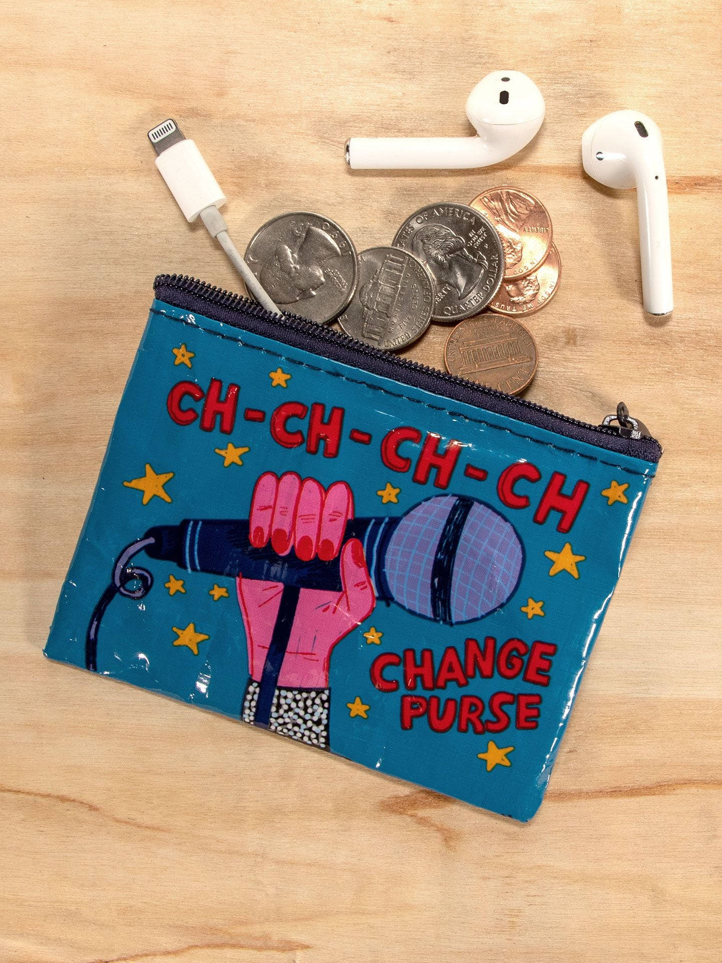 Coin purse - Ch-Ch-Change with coins and ear phones on a wooden background