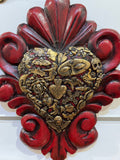 Mexican wall decoration- Wooden swirl carved heart with milagros charms