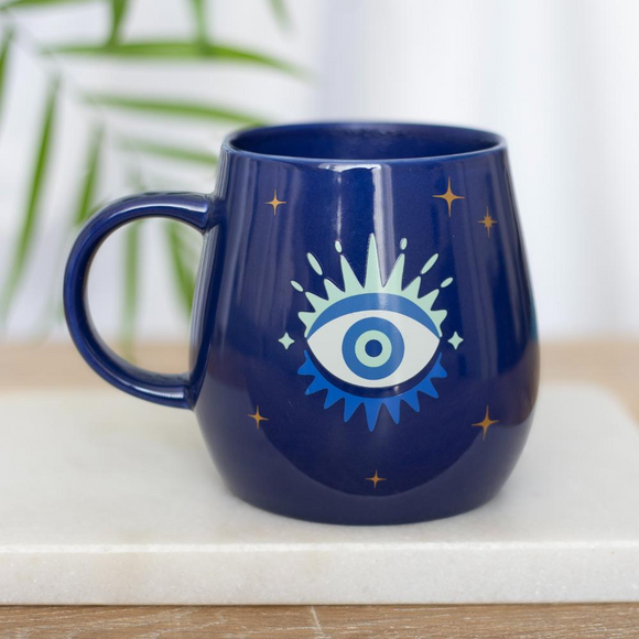 Colour changing mug with open evil eye design