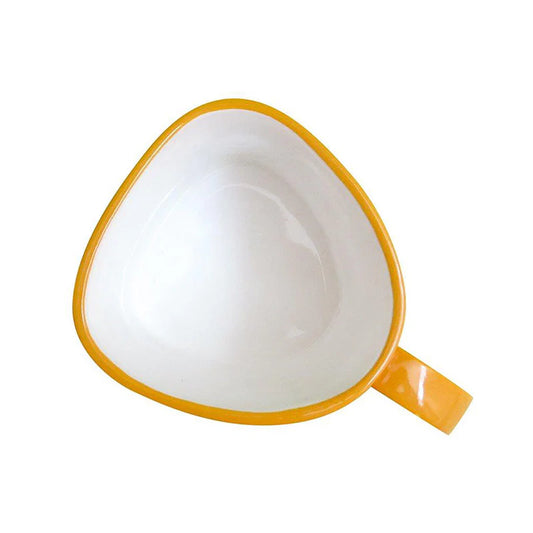 Yellow mug with white interior on a white background