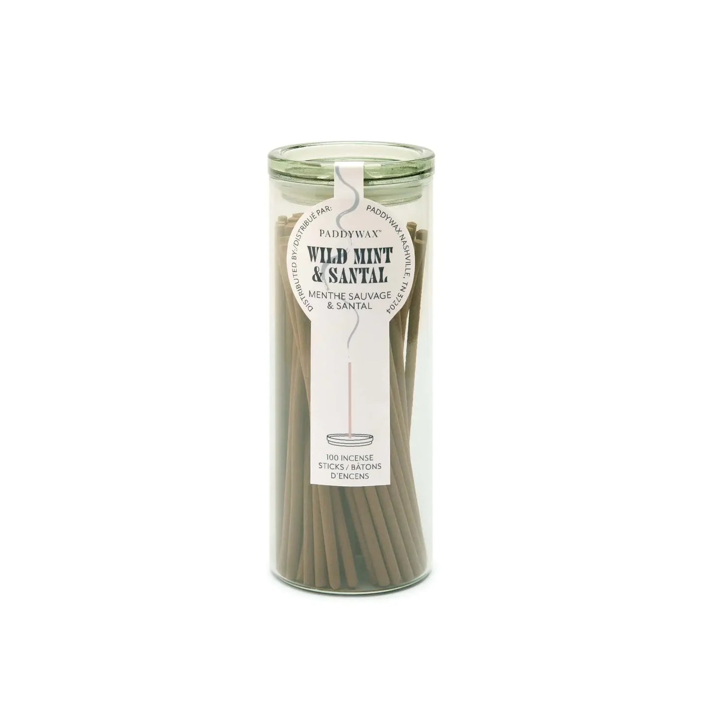 Paddywax Wild Mint & Saval incense sticks in a cylindrical glass container on a white background