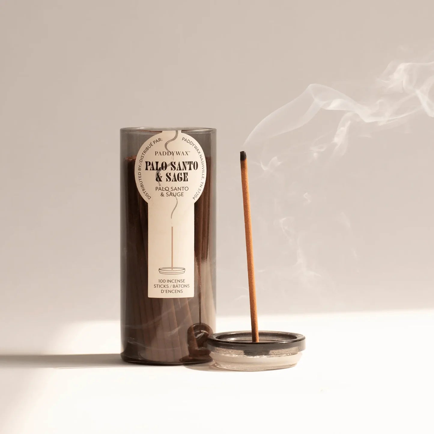 Incense stick with Palo Santo & Sage packaging on a neutral background