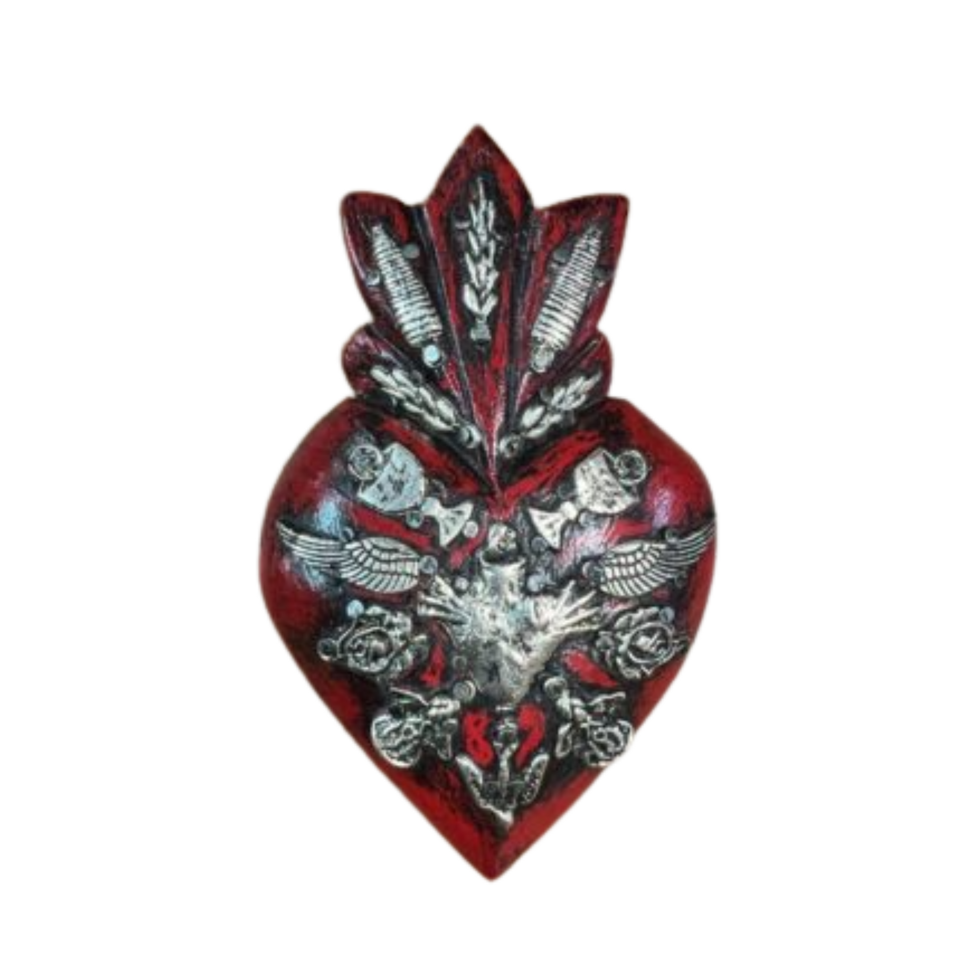 Decorative heart-shaped object with intricate designs(Metal charms) on a white background