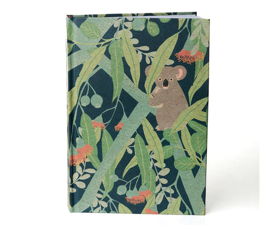 Notebook with a koala and leaf design on a white background