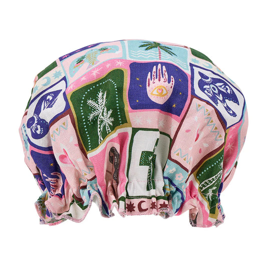 Colorful shower cap with abstract designs on a white background