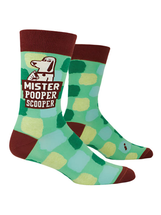 Blue Q Mister Pooper Scooper men's crew socks. Green socks with a brown band on heel, toe . Features a cartoon of a dog pointing to the camera.