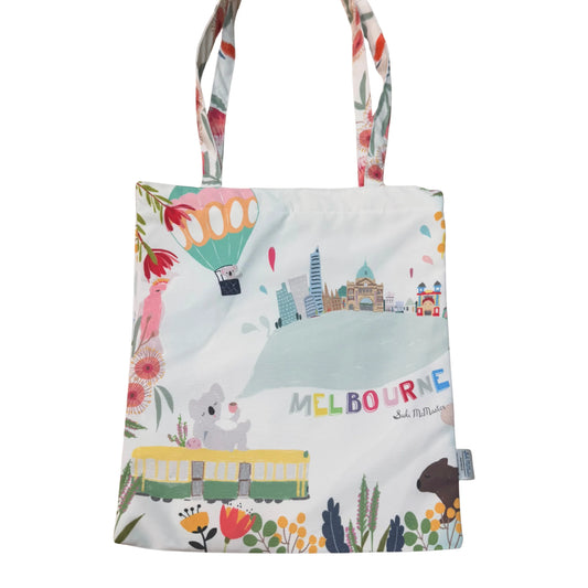 Tote bag with Melbourne-themed design featuring koalas, trams, and city skyline.