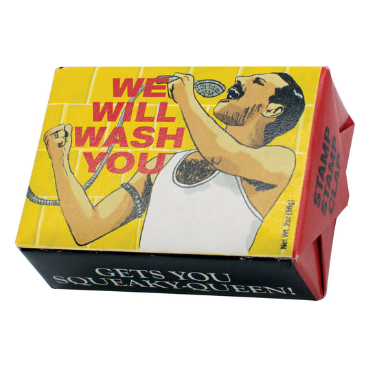 A yellow packaged bar of We will wash you soap by The Unemployed Philosophers Guild, on a white background.