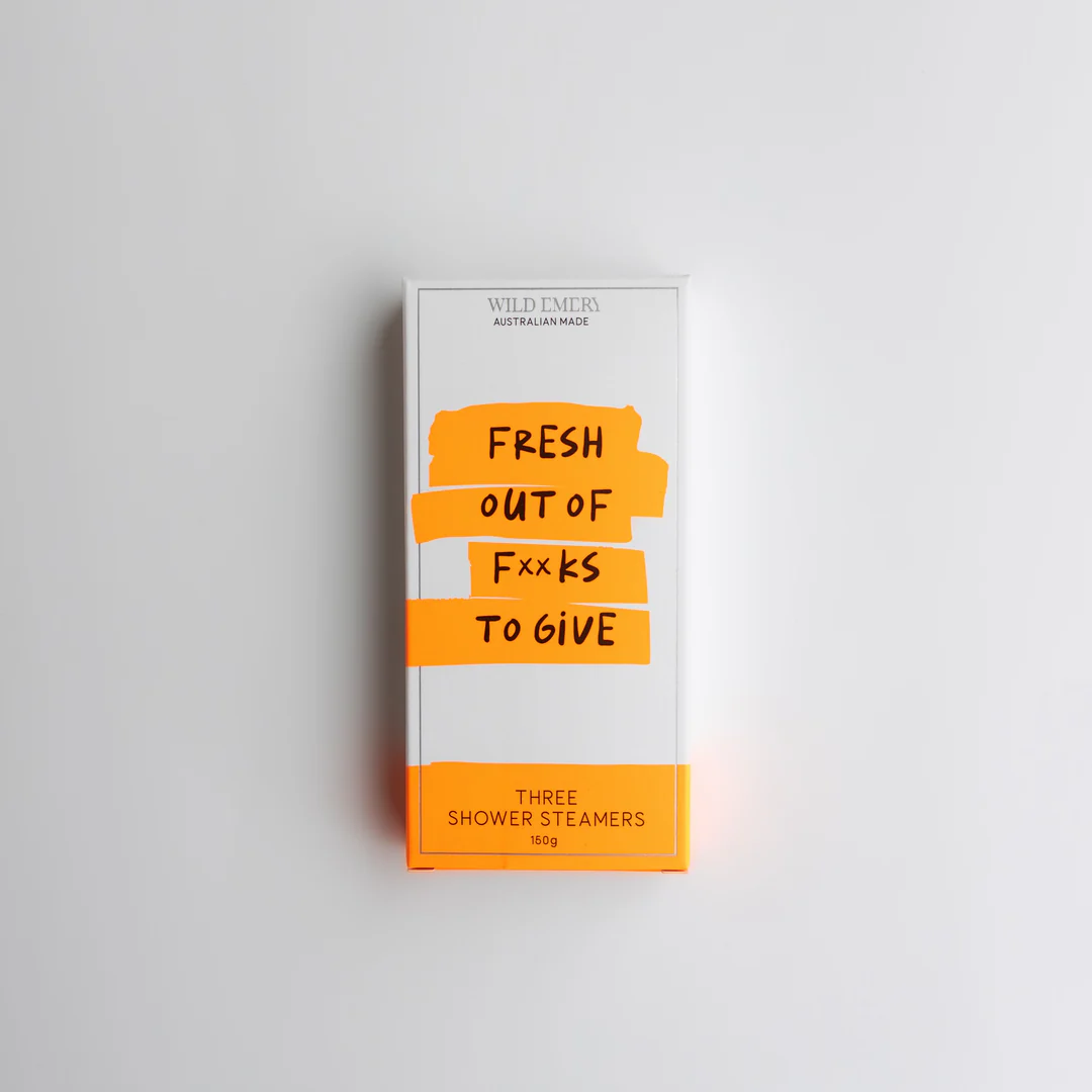 AN orange box containing a trio of ild Emery shower steamers. Caption reads: Fresh out of f**Ks to give!